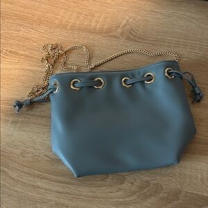 Stylish Blue Handbag with Gold Chain